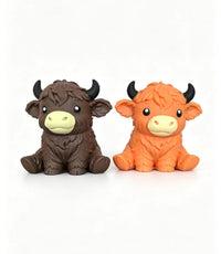 Two highland cow squishies, chocolate and ginger