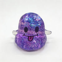 Purple glitter smiley ghost squishy