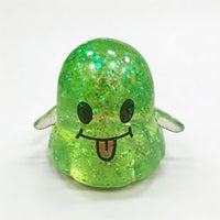 Green glitter smiley ghost squishy